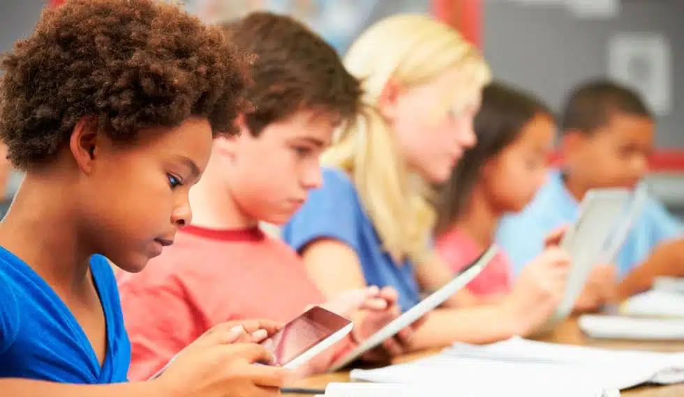 Group of students back to school using an LMS platform